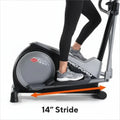 Person using a ProForm elliptical with a focus on stride length indication.