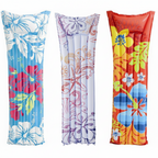 Three colorful inflatable pool float backrests shown side by side on a white background, each with a different tropical floral print. The left float is blue and white with red and yellow flowers, the middle is white and purple with pink and orange motifs, and the right is orange and red with yellow and blue flowers.