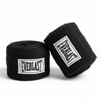 Two rolls of black Everlast boxing hand wraps on a white background