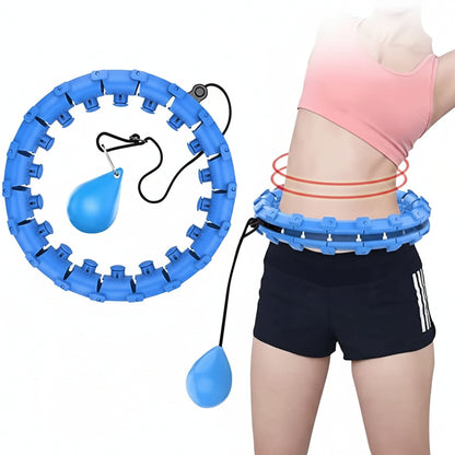 Blue hula hoop with weight loss bands around a person's waist