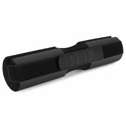 Black foam roller on a white background