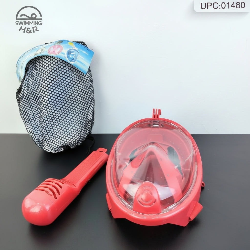 A red full-face snorkel mask with a clear dome, a red snorkel tube, a black mesh carrying bag, and a small sign reading 'WE ARE H&R' on a white background.