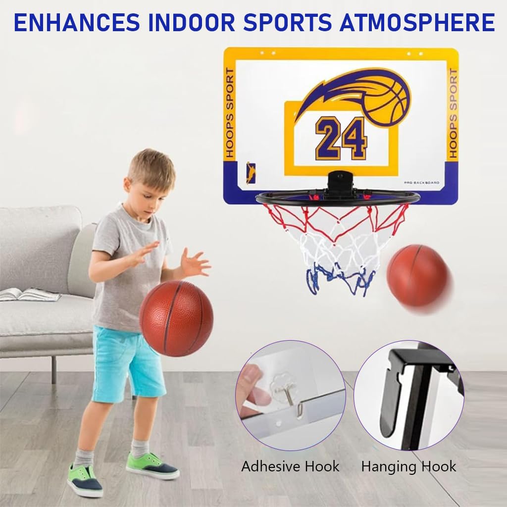 A child playing with a basketball in a living room setting, with a wall-mounted hoop and backboard shown above. The backboard features a yellow, purple, and blue design with the number 24 and a basketball graphic.