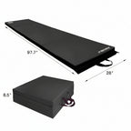 Black exercise mat with dimensions on a beige background