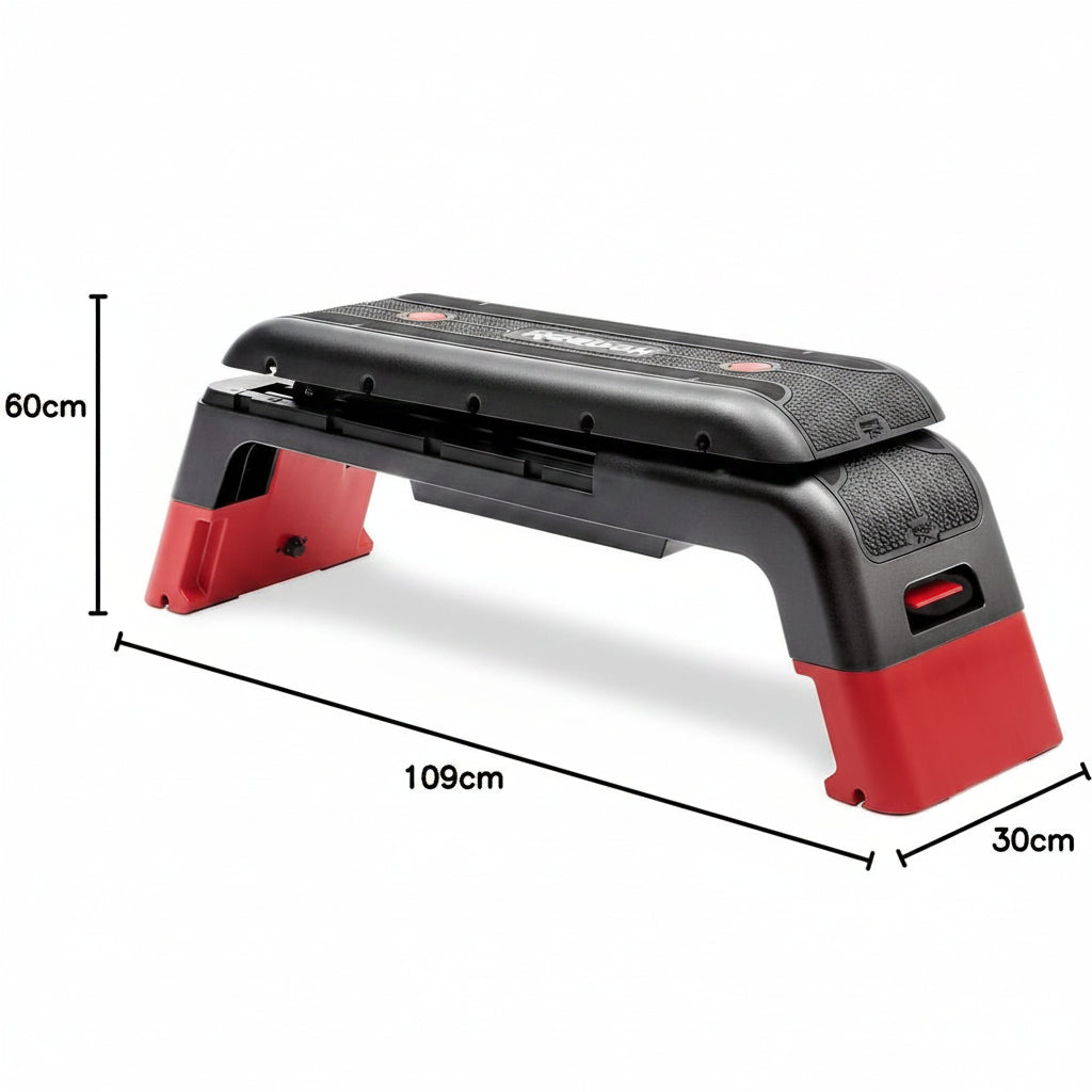 Black and red Reebok step platform with dimensions on a white background