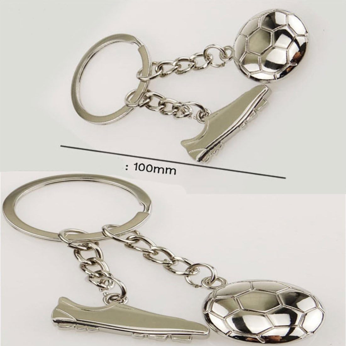 Silver metal soccer-themed keychain with a cleat and soccer ball charms, shown on 