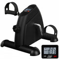 Black mini exercise bike with digital display on a white background