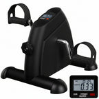 Black mini exercise bike with digital display on a white background