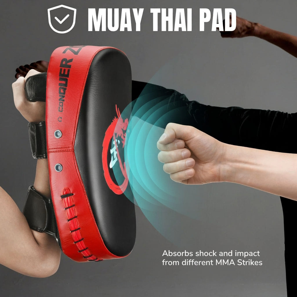 Red and black Muay Thai pad with a person holding it and another person striking it, on a gray background.