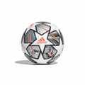 An Adidas Champions League Final 2024 soccer ball featuring a white base with black and gray 