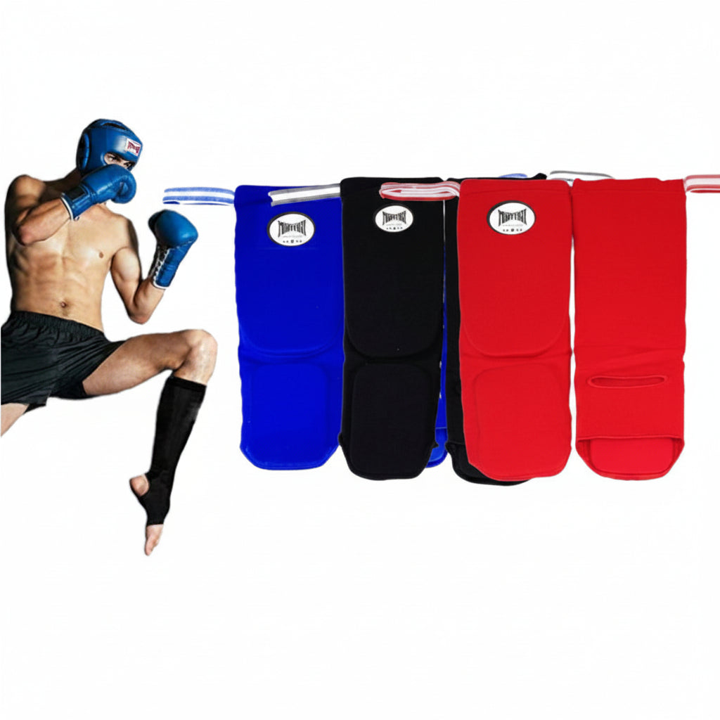 Four martial arts leg wraps in blue, black, and red hanging on a white background, next to a shirtless man wearing blue boxing gloves and a black leg wrap.