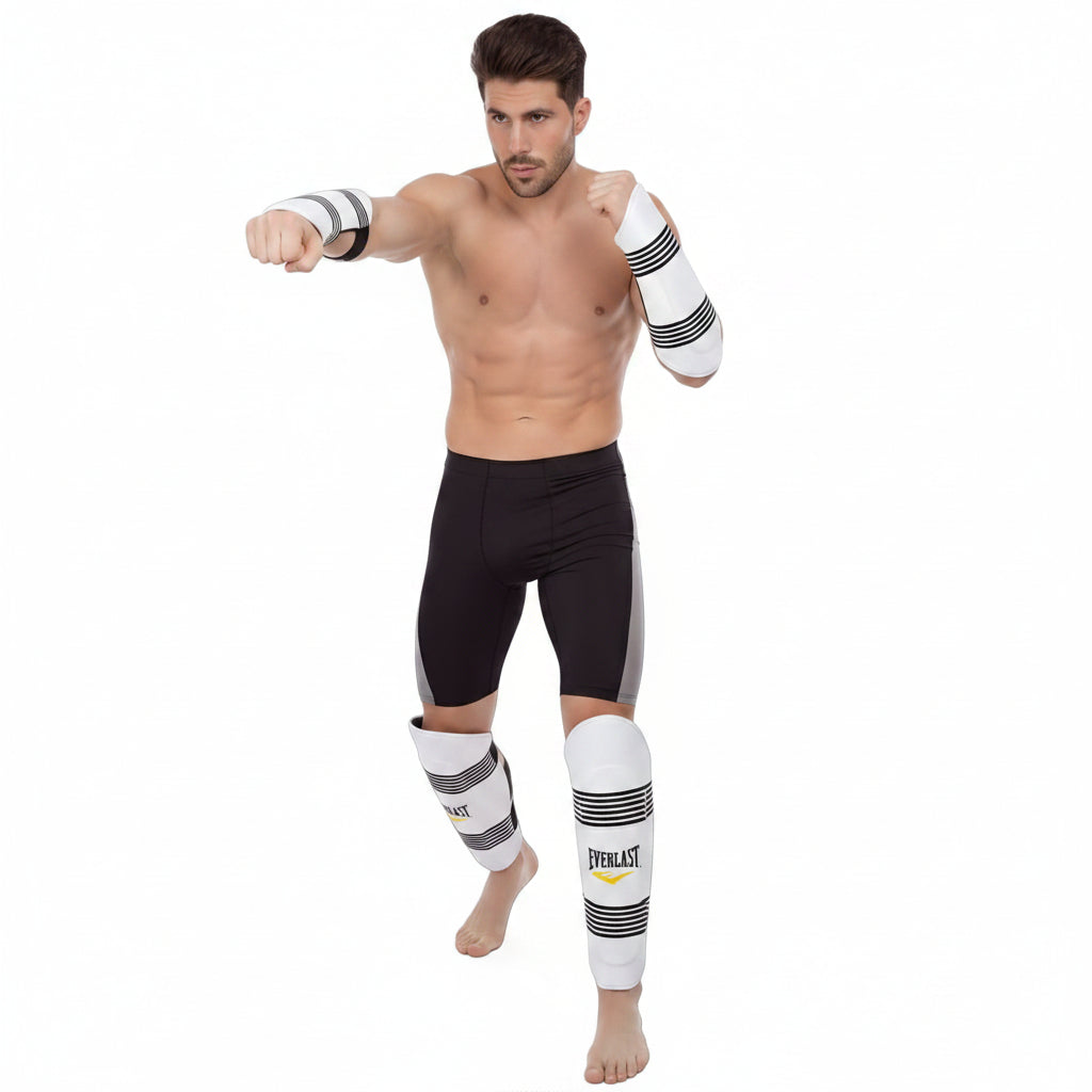 A shirtless male model wearing Everlast athletic compression sleeves 