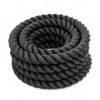 Close-up of thick black twisted rope or cable coiled 