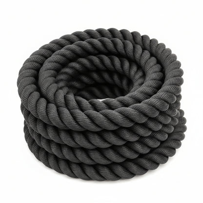 Close-up of thick black twisted rope or cable coiled 