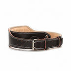 A black leather belt with white contrast stitching, silver-tone metal hardware, and a tan interior lining 