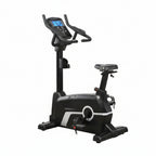 Black exercise bike with digital display on a white background