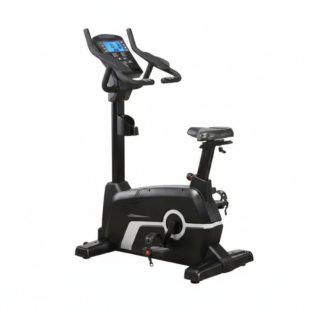Black exercise bike with digital display on a white background