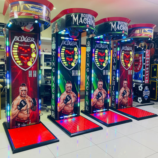 Four boxing machine arcade games in a row with colorful displays and images of boxers.