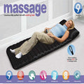 Woman lying on a massage mat with various features highlighted on a white background
