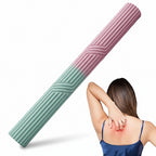 Multicolored foam roller with a person using it on a white background