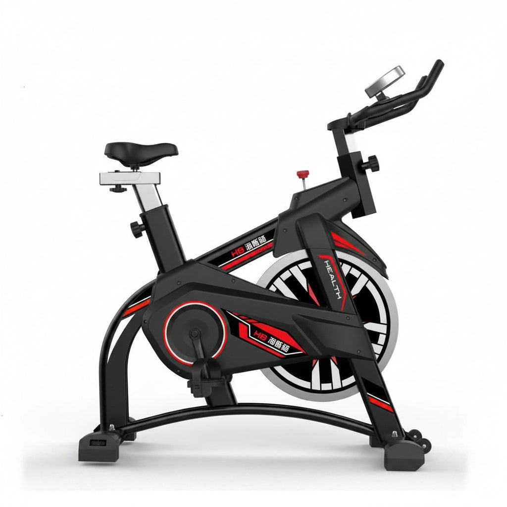 Black and red exercise bike on a white background