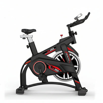 Black and red exercise bike on a white background