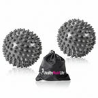 Two gray spiked massage balls with a black drawstring bag labeled 'Healthy Mode Life' on a white background.