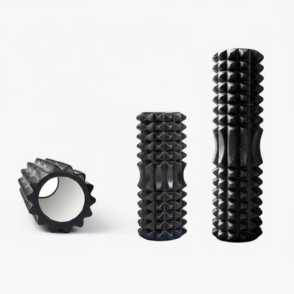 Black textured foam roller with measurements on a white background