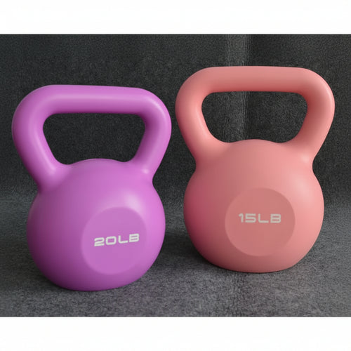 Purple and pink kettlebells with weight markings on a dark background