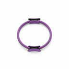 Purple Pilates ring with black clips on a white background