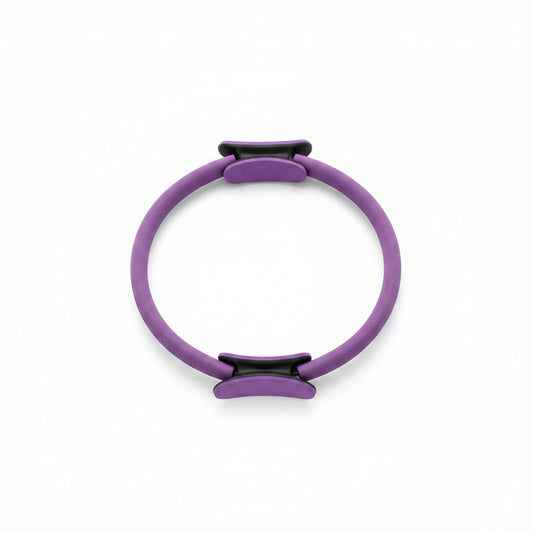 Purple Pilates ring with black clips on a white background