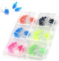 Colorful earplugs in a transparent box on a white background
