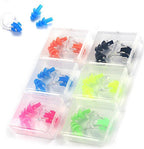 Colorful earplugs in a transparent box on a white background