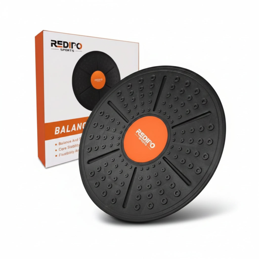 Black balance disc with orange center and 'RedRfo' branding, next to a RedRfo branded box on a white background.