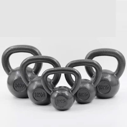 Five cast iron kettlebells in different weights (5kg, 6kg, 12kg, 15kg, 20kg) arranged in a semi-circle on a light gray background.