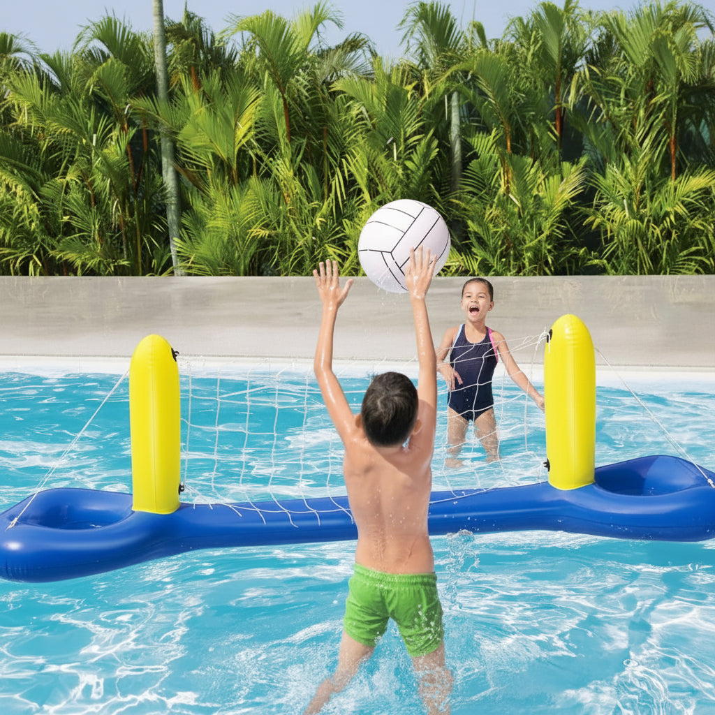 Two children playing volleyball in a pool with inflatable net and posts.