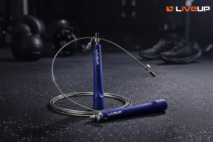 LiveUp jump rope on a dark textured surface with 'LiveUp' branding.