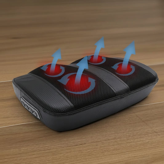 Massage pillow with red lights and blue arrows on a wooden surface