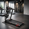 Portable treadmill on a mat in a gym setting with HCR Running branding.
