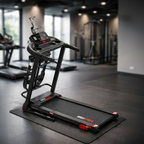 Portable treadmill on a mat in a gym setting with HCR Running branding.
