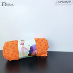 An orange yoga mat rolled up and wrapped 